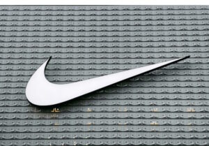 Nike logo on gray textured background
